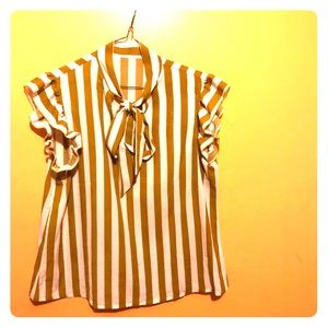 A blouse with frills on the sleeves